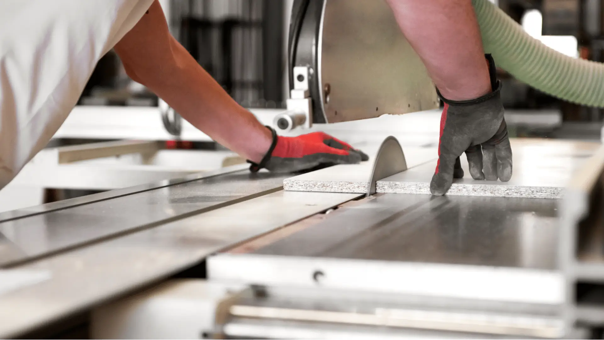 person cutting metal