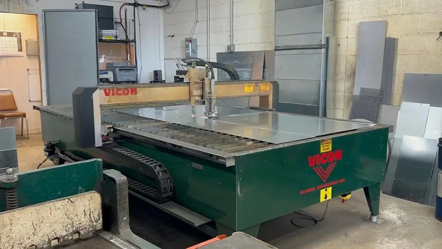 CNC plasma cutting table loaded with steel plate at a Columbus Ohio sheet metal shop